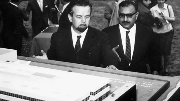 Paolo Budinich (left) and Abdus Salam inspect a model of the ICTP main building in 1964