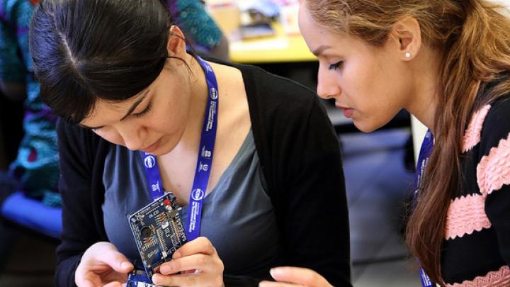 Workshop participants building a radiation detector