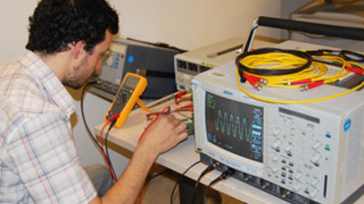 Course participant tests an FPGA board.