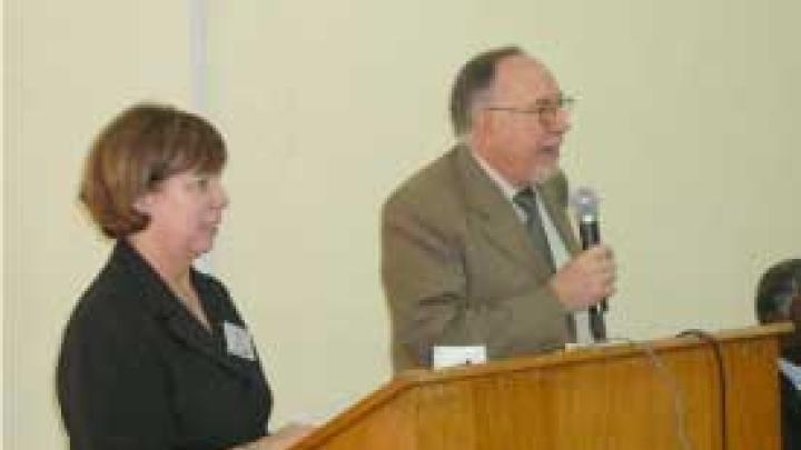 Patricia Doherty (left) of Boston College and Sandro Radicella of ICTP at opening ceremony of the Nigerian National Meeting on GNSS Science and Application, Abuja.