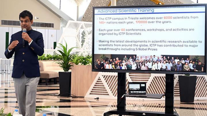 ICTP Director Atish Dabholkar presenting ICTP during a visit to the University of Sharjah