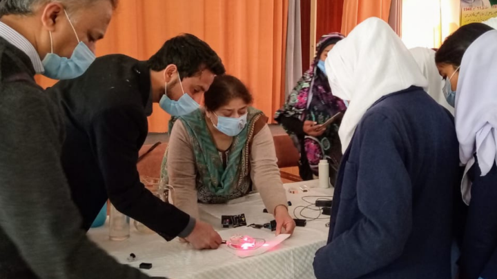 Dr. Ashraf leads a demonstration at a local school 